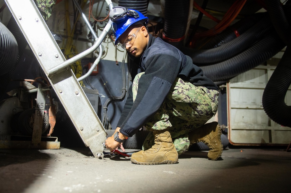 Sailors repair equipment