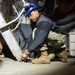 Sailors repair equipment