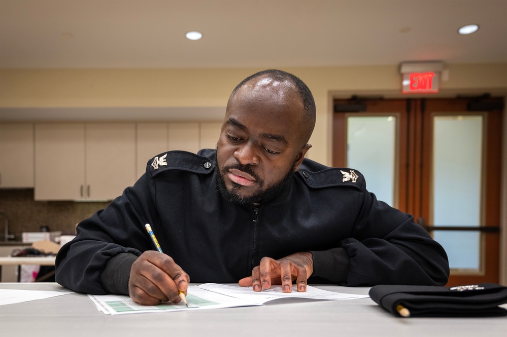 Sailors participate in the Navywide E6 advancement exam