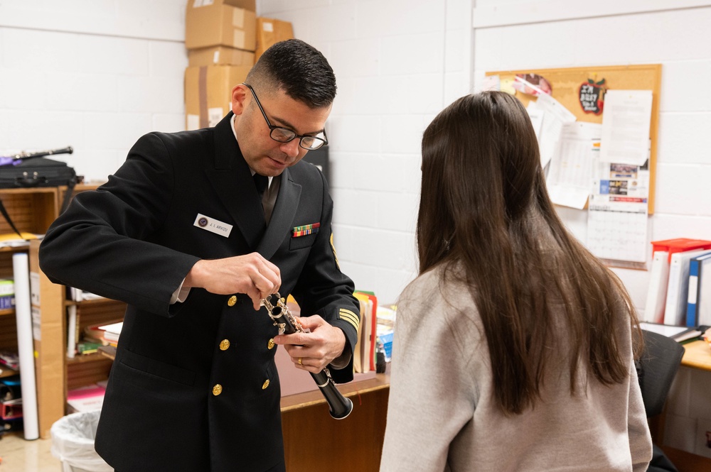 Navy Band musician returns home to Ft. Osage High School