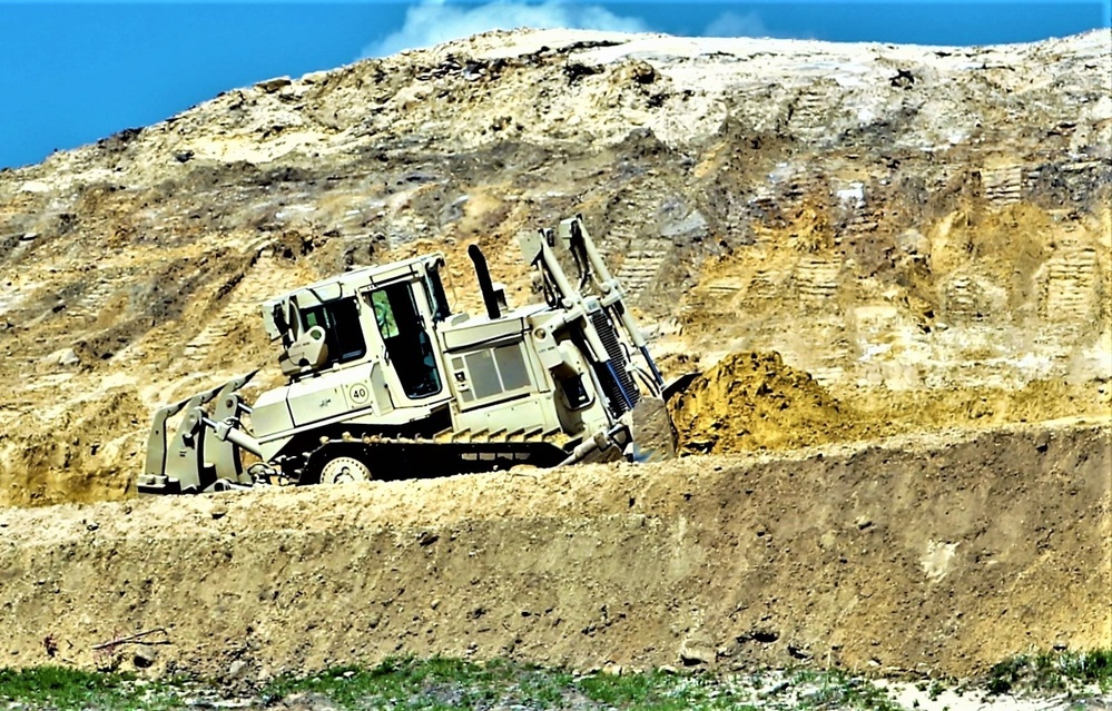 Army Reserve engineer company Soldiers continue work on earth-moving troop project at Fort McCoy