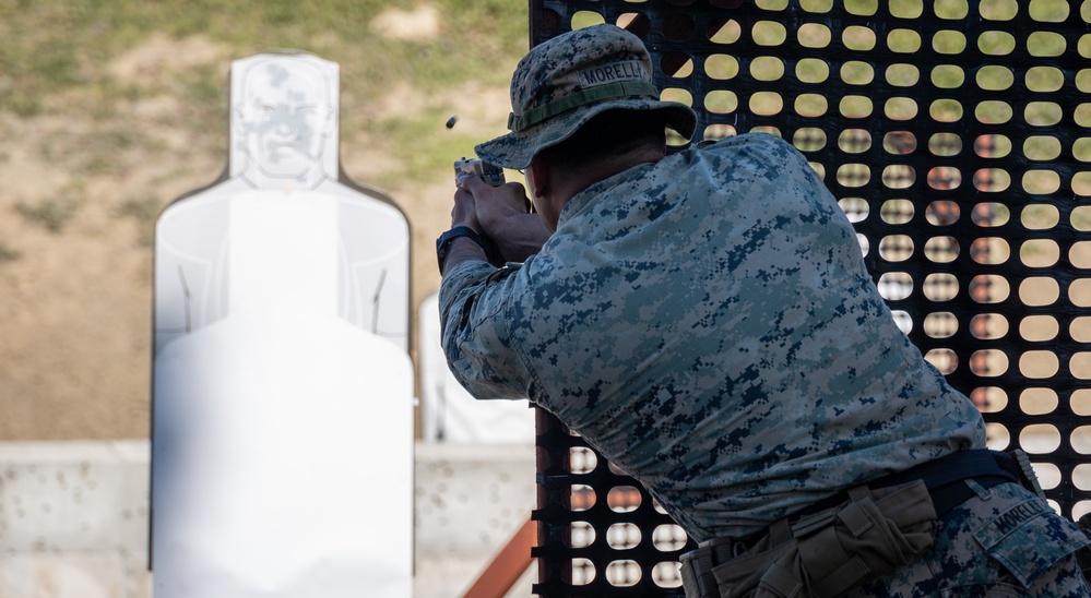 Civilians and service members participate in Marine Corps Marksmanship Competition