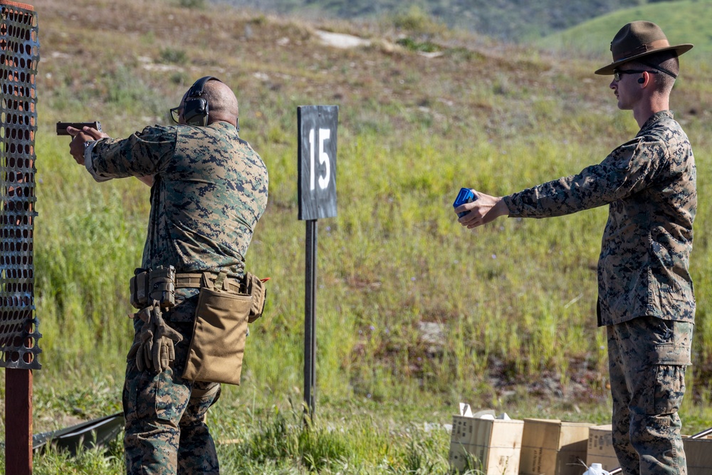 Civilians and service members participate in Marine Corps Marksmanship Competition