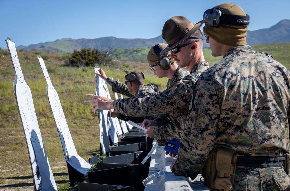 Civilians and service members participate in Marine Corps Marksmanship Competition