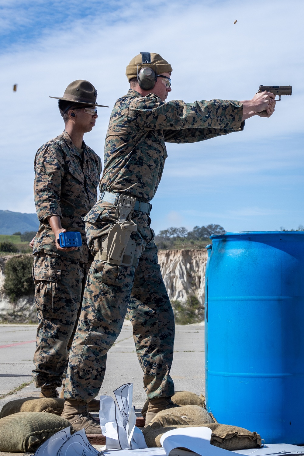 Civilians and service members participate in Marine Corps Marksmanship Competition