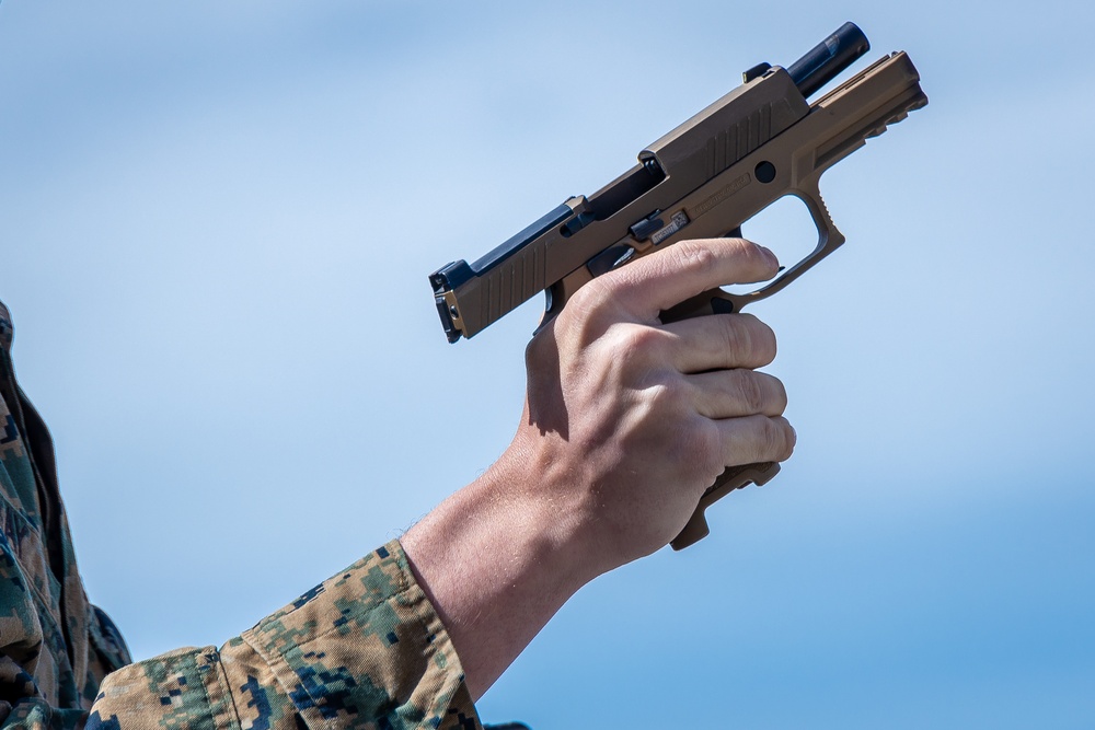 Civilians and service members participate in Marine Corps Marksmanship Competition