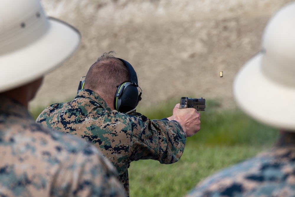 Civilians and service members participate in Marine Corps Marksmanship Competition