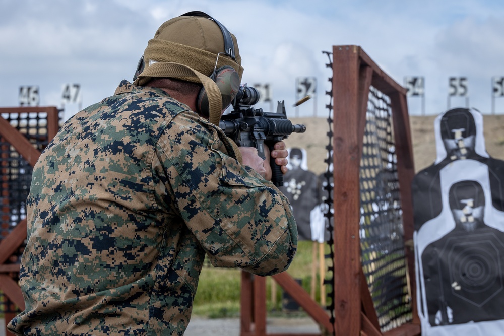 Civilians and service members participate in Marine Corps Marksmanship Competition