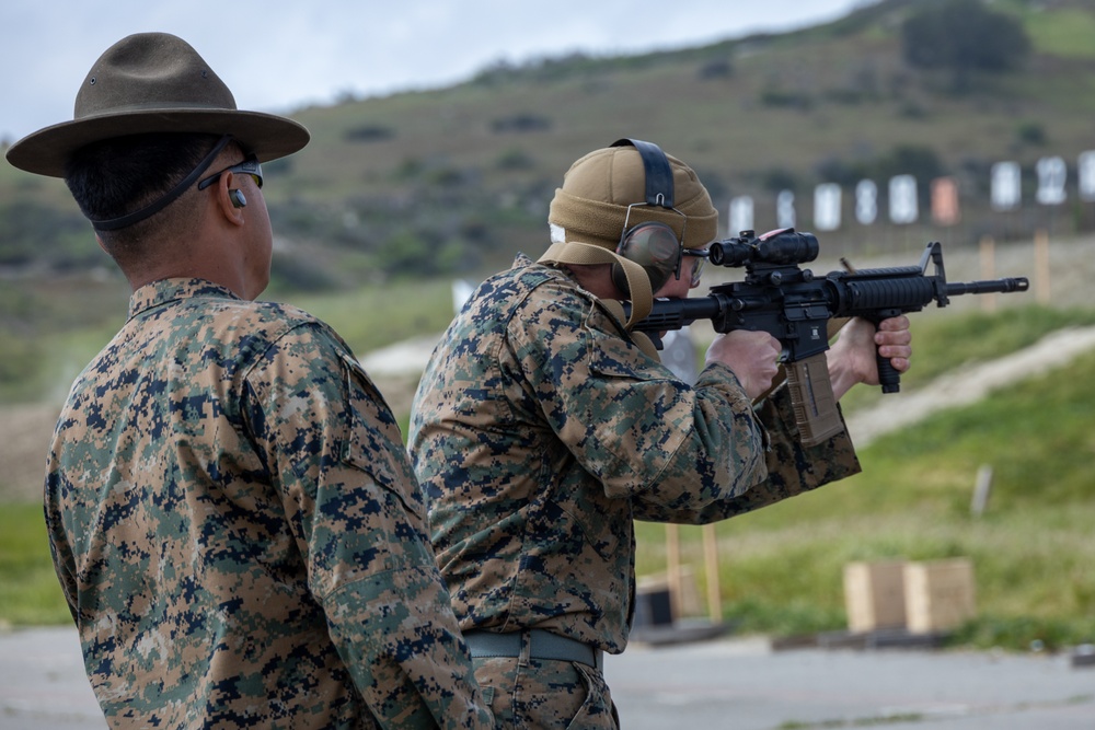 Civilians and service members participate in Marine Corps Marksmanship Competition