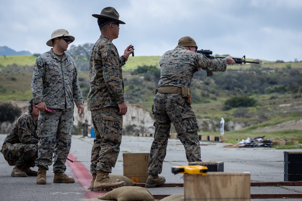 Civilians and service members participate in Marine Corps Marksmanship Competition