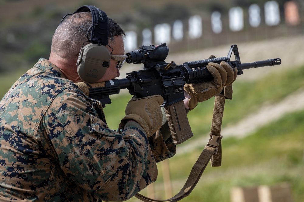 Civilians and service members participate in Marine Corps Marksmanship Competition