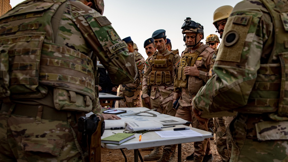 Combined Joint Task Force – Operation Inherent Resolve Conducts a Joint Training Exercise with Iraq 8th Army Artillery Soldiers