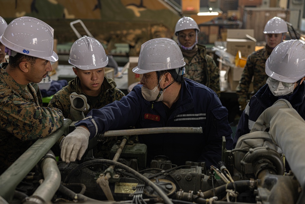 U.S. Marines with 3rd Maintenance Battalion conduct a subject matter expert exchange with Republic of Korea Marines during Korean Marine Exercise Program