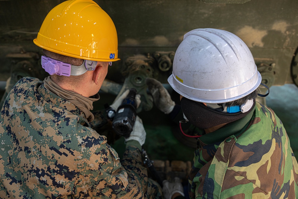 U.S. Marines with 3rd Maintenance Battalion conduct a subject matter expert exchange with Republic of Korea Marines during Korean Marine Exercise Program