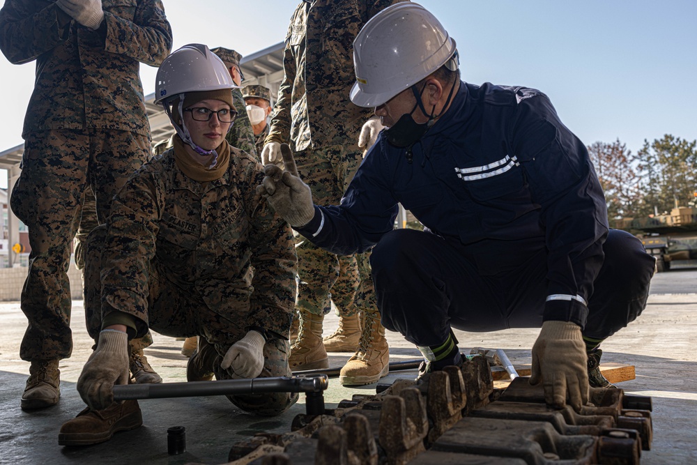 U.S. Marines with 3rd Maintenance Battalion conduct a subject matter expert exchange with Republic of Korea Marines during Korean Marine Exercise Program