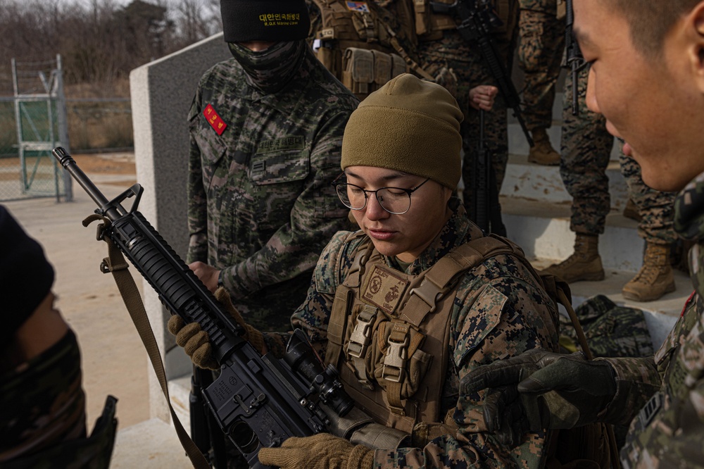 U.S. Marines with 3rd Maintenance Battalion and Republic of Korea Marines with Maintenance Battalion, Marine Logistics Group conduct close quarters combat training during Korean Marine Exercise Program