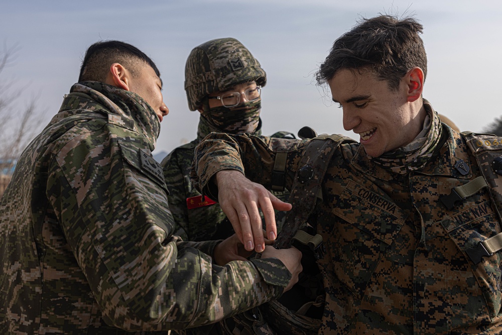 U.S. Marines with 3rd Maintenance Battalion and Republic of Korea Marines with Maintenance Battalion, Marine Logistics Group conduct close quarters combat training during Korean Marine Exercise Program