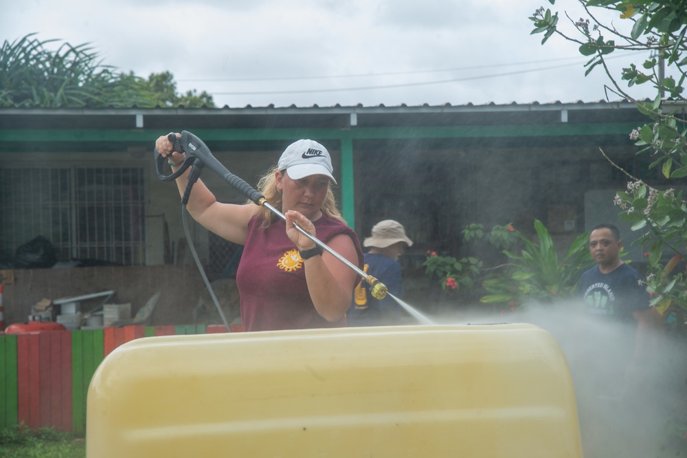 Sailors Participate In A Community Outreach Project