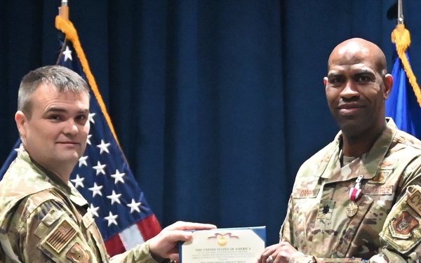 960th OSF changes commanders; outgoing commander awarded Meritorious Service Medal