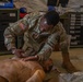 Sgt. Asuerus Thompson checks breathing