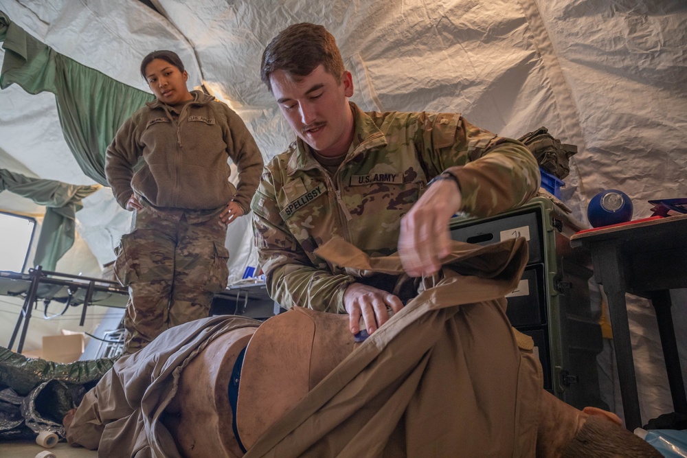 2nd Lt. Liam Spellissy assesses a patient