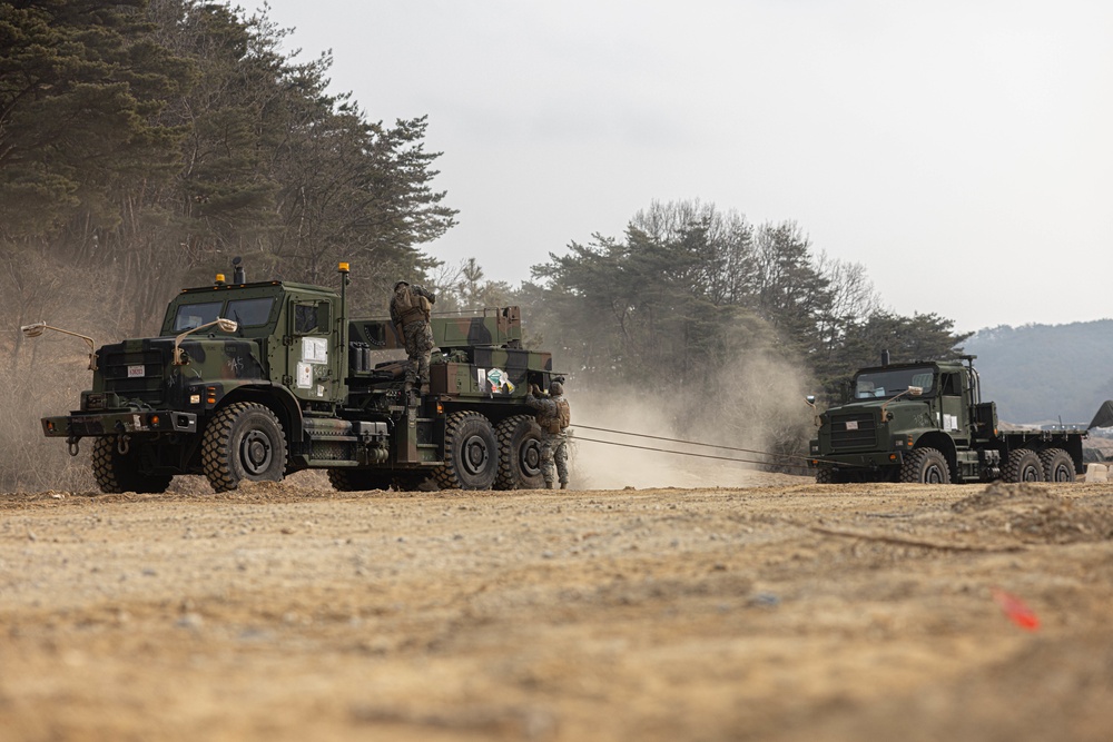 U.S. Marines with 3rd Maintenance Battalion and Republic of Korea Marines participate in vehicle recovery drills and weapon disassembly and assembly contest during Korean Marine Exercise Program