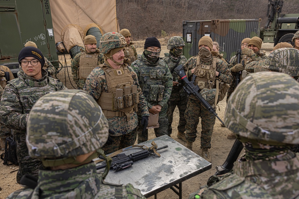 U.S. Marines with 3rd Maintenance Battalion and Republic of Korea Marines participate in vehicle recovery drills and weapon disassembly and assembly contest during Korean Marine Exercise Program