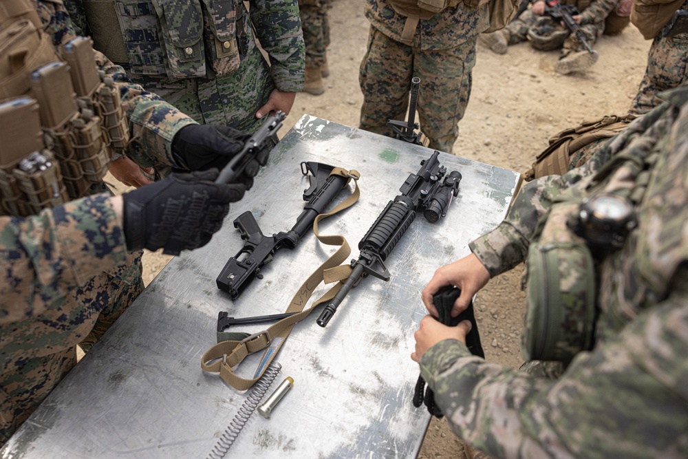 U.S. Marines with 3rd Maintenance Battalion and Republic of Korea Marines participate in vehicle recovery drills and weapon disassembly and assembly contest during Korean Marine Exercise Program