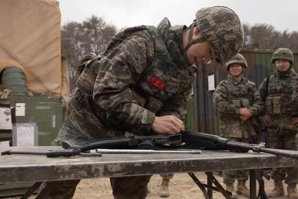 U.S. Marines with 3rd Maintenance Battalion and Republic of Korea Marines participate in vehicle recovery drills and weapon disassembly and assembly contest during Korean Marine Exercise Program