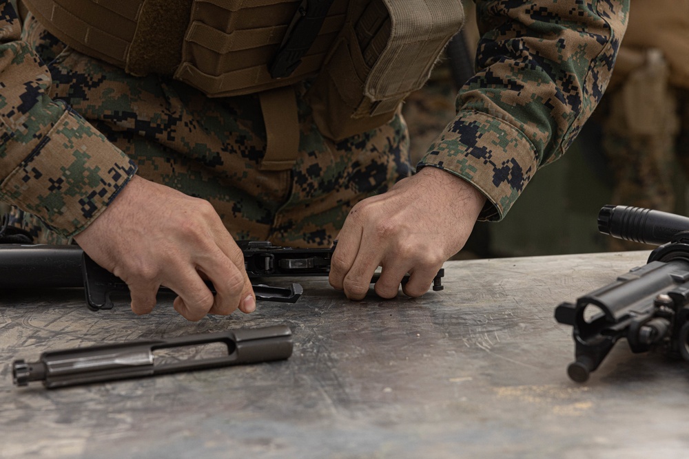 U.S. Marines with 3rd Maintenance Battalion and Republic of Korea Marines participate in vehicle recovery drills and weapon disassembly and assembly contest during Korean Marine Exercise Program