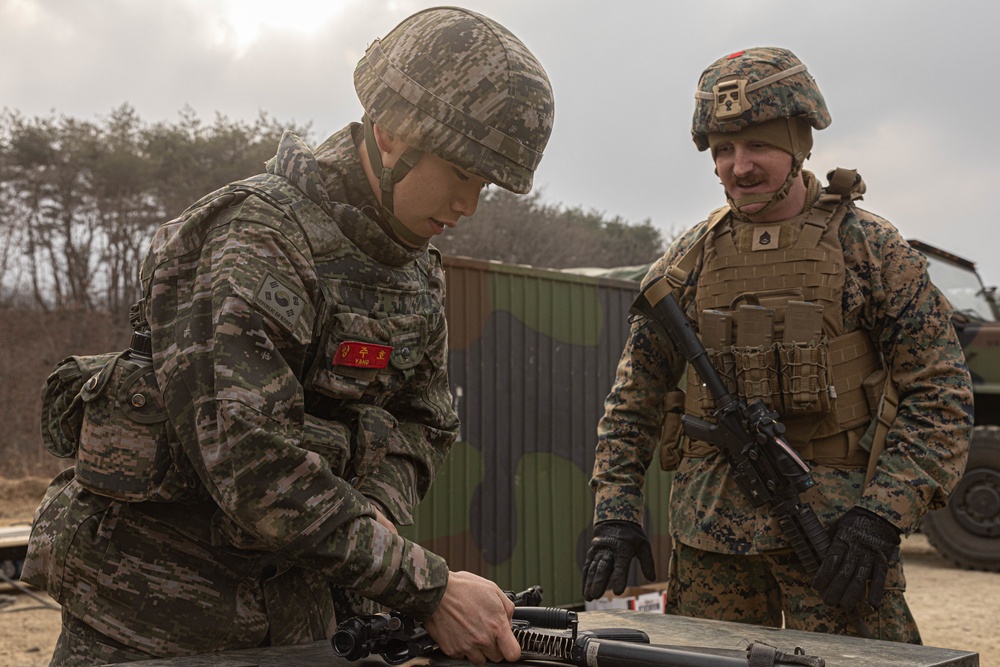 U.S. Marines with 3rd Maintenance Battalion and Republic of Korea Marines participate in vehicle recovery drills and weapon disassembly and assembly contest during Korean Marine Exercise Program