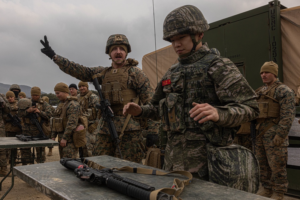 U.S. Marines with 3rd Maintenance Battalion and Republic of Korea Marines participate in vehicle recovery drills and weapon disassembly and assembly contest during Korean Marine Exercise Program