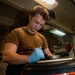 Sailor Assembles An Aircraft Tire