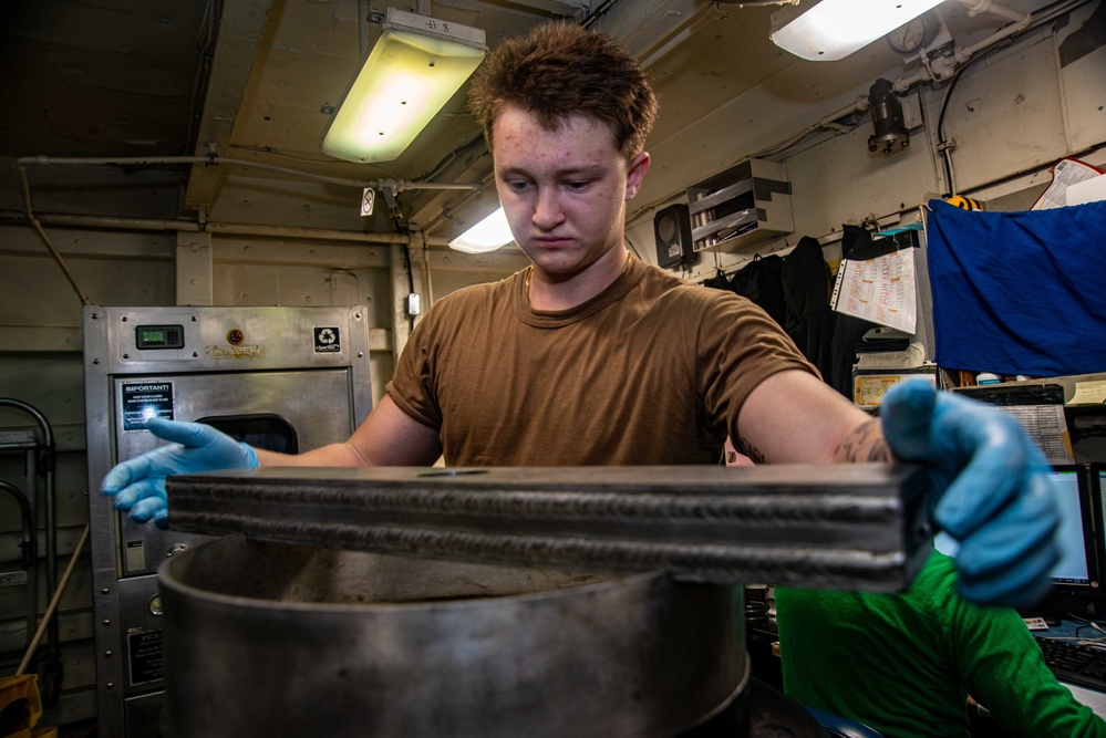 Sailor Assembles An Aircraft Tire