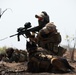 Austrian and Ghanaian soldiers conduct an objective raid