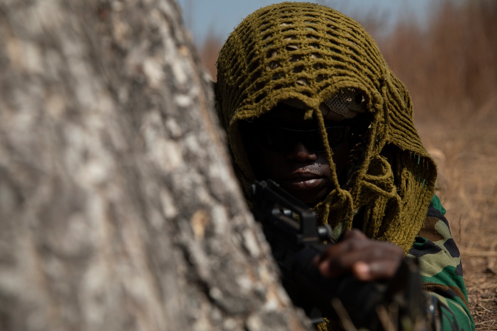 Ghanaian soldiers conduct an objective raid