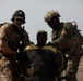 Austrian and Ghanaian soldiers conduct an objective raid