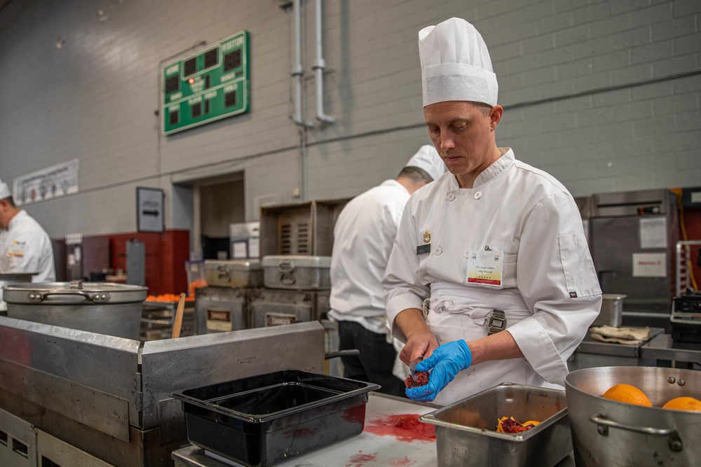 Sgt. 1st Class Jeffery Vaughan slices a blood orange