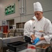 Sgt. 1st Class Jeffery Vaughan slices a blood orange