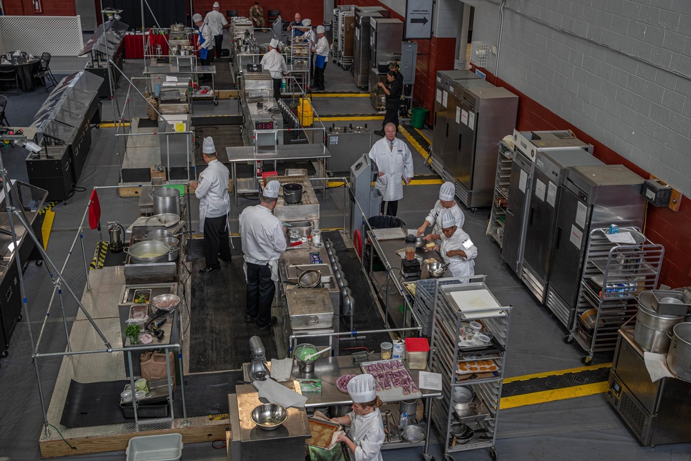 Soldiers with the Army Reserve Culinary Arts Team compete in the mobile kitchen trailer event