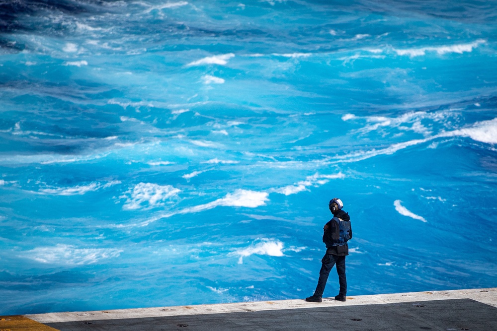 Sailor Looks Out At Pacific Ocean