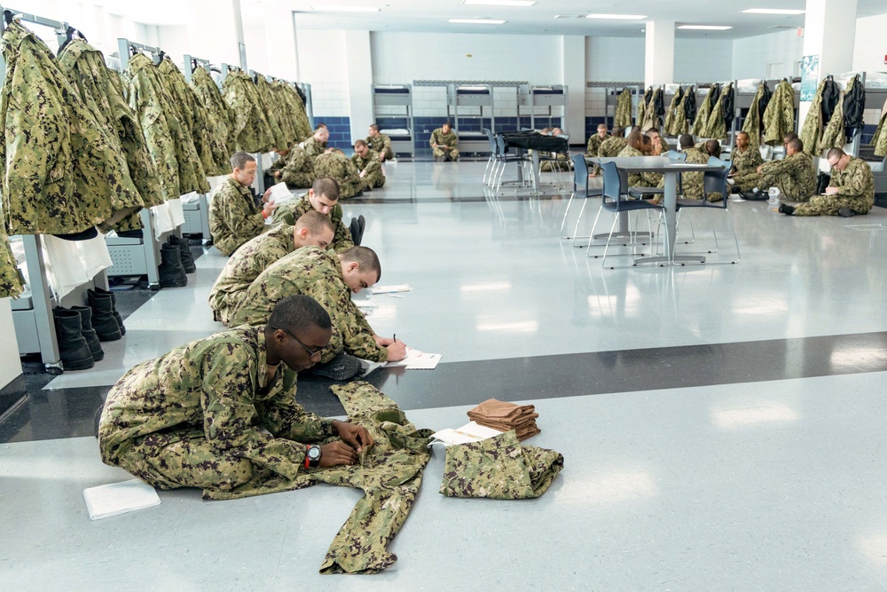 Recruits write letters during holiday routine at Recruit Training Command