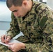 Recruits write letters during holiday routine at Recruit Training Command