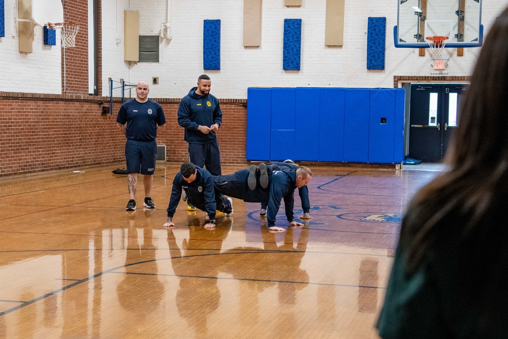 Recruit Training Command Sailors workout with local high schoolers