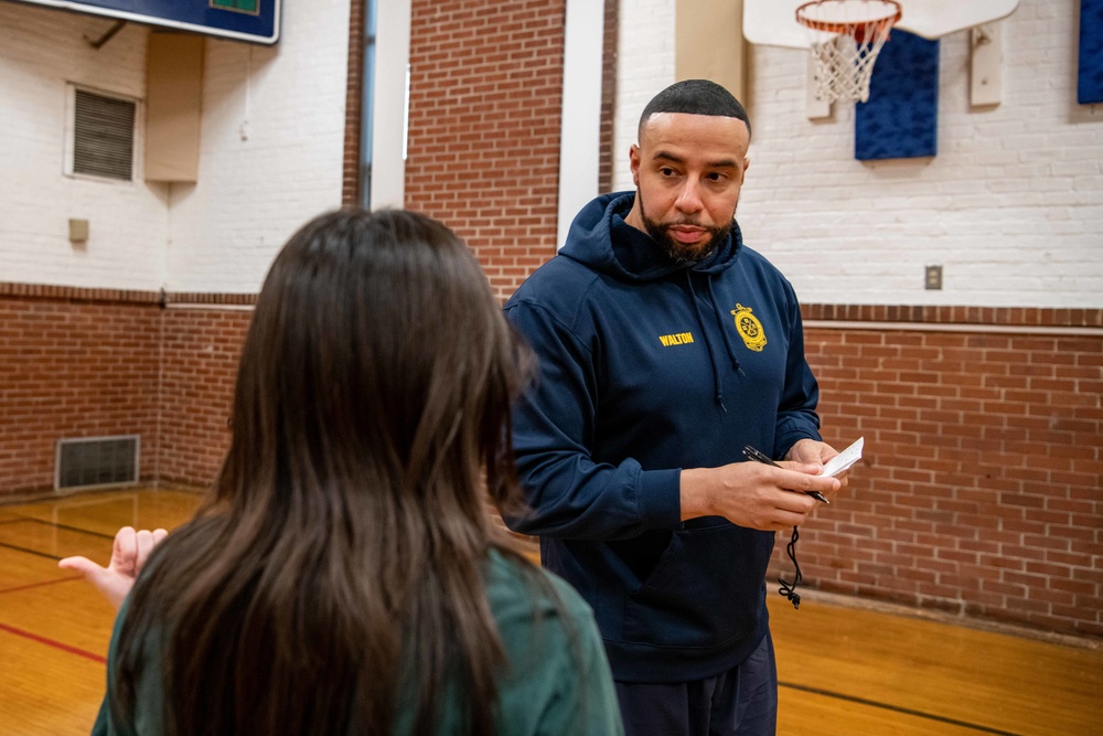 Recruit Training Command Sailors workout with local high schoolers