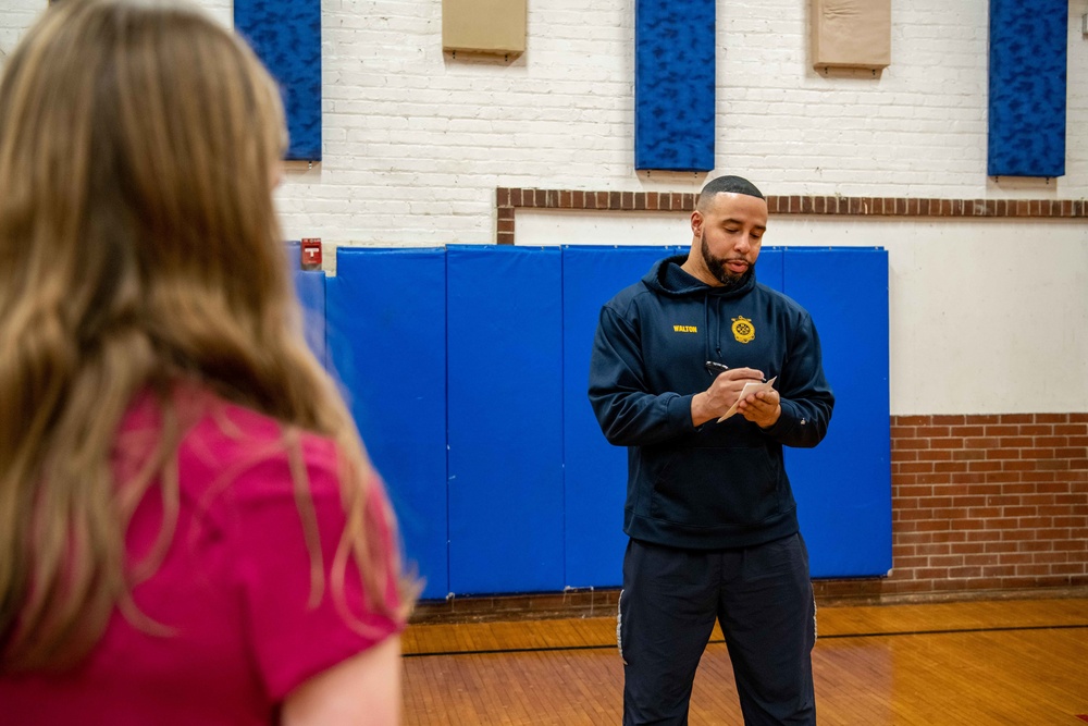 Recruit Training Command Sailors workout with local high schoolers