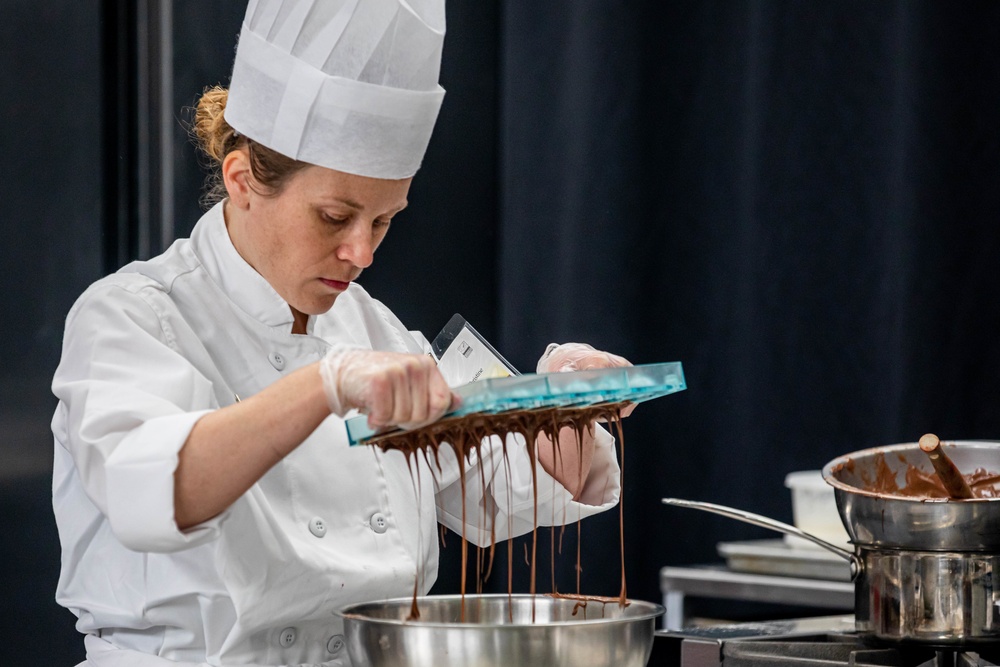 Chief Warrant Officer 2 Christine Stanley prepares chocolate