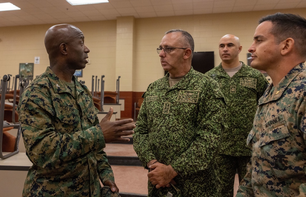 U.S. Marine Corps Col. Reginald J. McClam gives a base tour to the Commandant of the Columbian Marine Corps