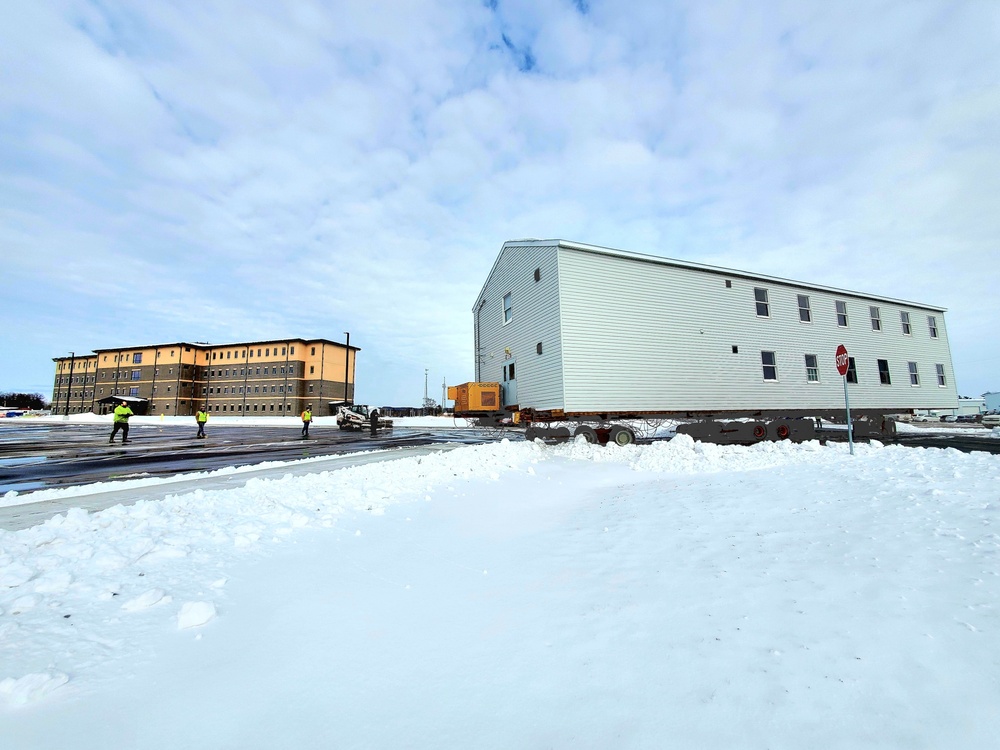 History made: Contractor moves first two World War II-era barracks at Fort McCoy