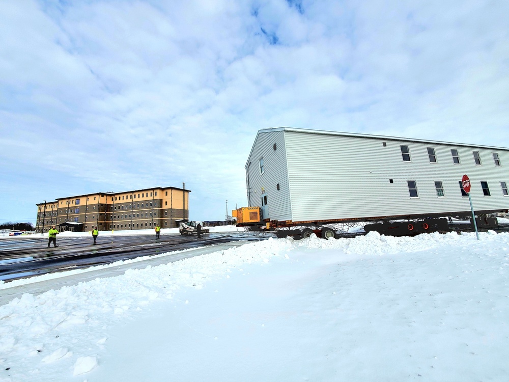 History made: Contractor moves first two World War II-era barracks at Fort McCoy